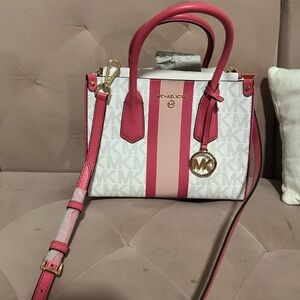 Pink and white Micheal Kors purse